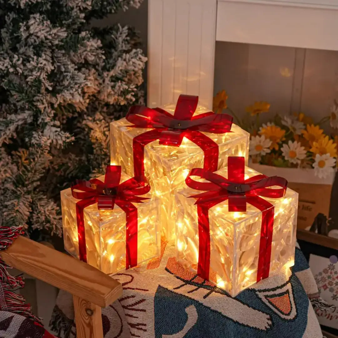 Lumora Lighted Christmas Gift Boxes - Transparent Warm White LED Present Decorations with Red Bows