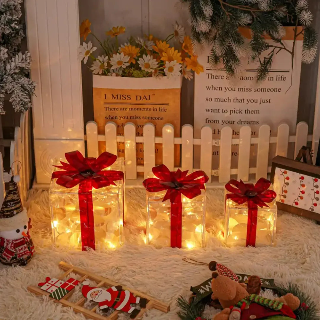 Lumora Lighted Christmas Gift Boxes - Transparent Warm White LED Present Decorations with Red Bows