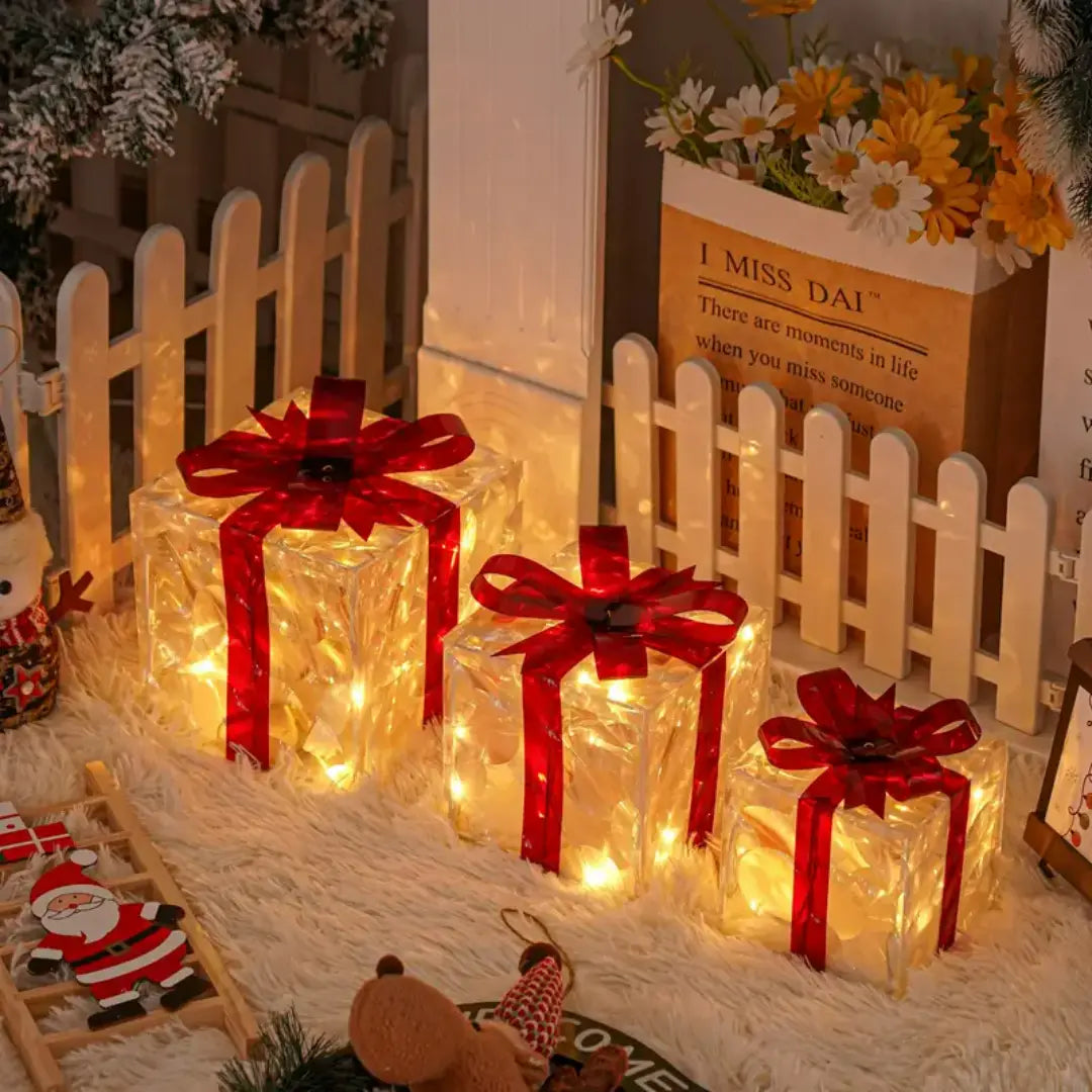 Lumora Lighted Christmas Gift Boxes - Transparent Warm White LED Present Decorations with Red Bows