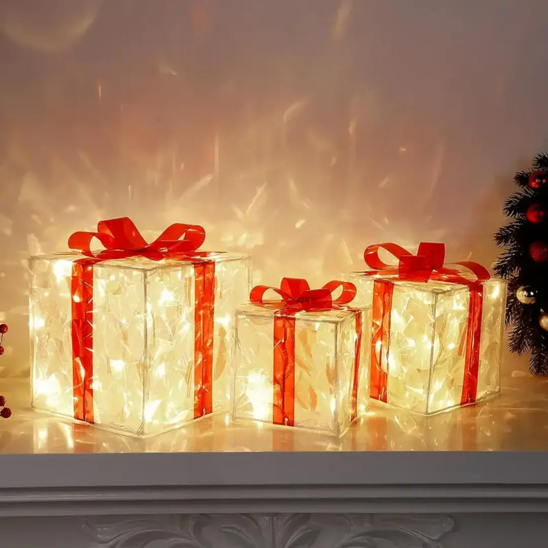 Lumora Lighted Christmas Gift Boxes - Transparent Warm White LED Present Decorations with Red Bows