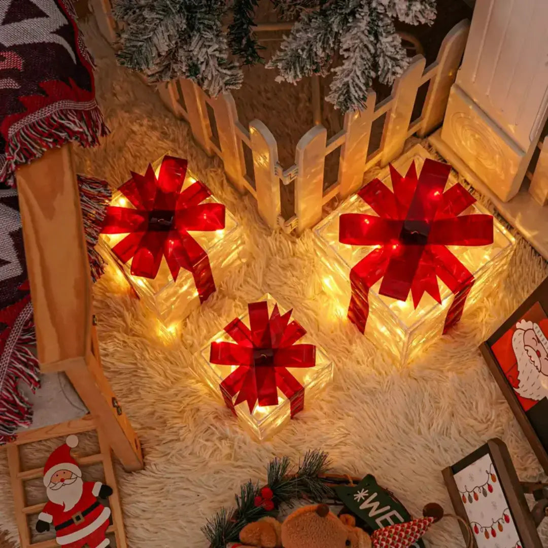 Lumora Lighted Christmas Gift Boxes - Transparent Warm White LED Present Decorations with Red Bows