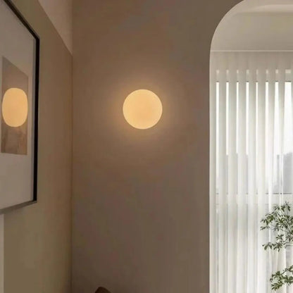 Aditya Circular Wall Light - Sleek Milk Glass Elegance for Modern Interiors