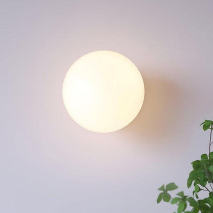 Marshmallow Globe Wall Sconce - Soft Glass Glow with Modern Chrome Finish